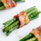 Green bean bundles wrapped in bacon.