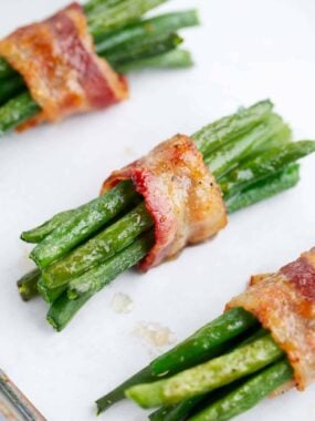Green bean bundles wrapped in bacon.