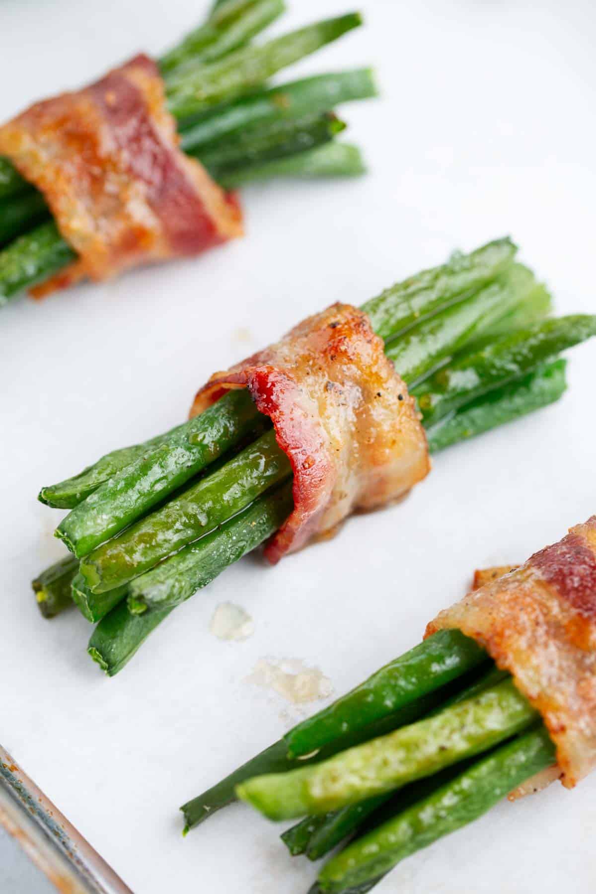 Green bean bundles wrapped in bacon.