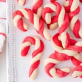 Candy cane cookies on a plate.