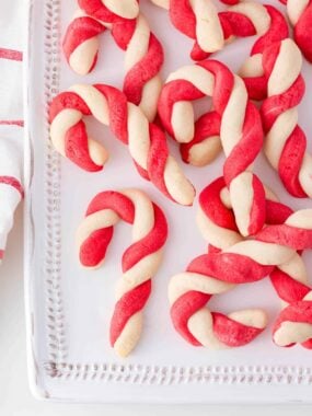Candy cane cookies on a plate.