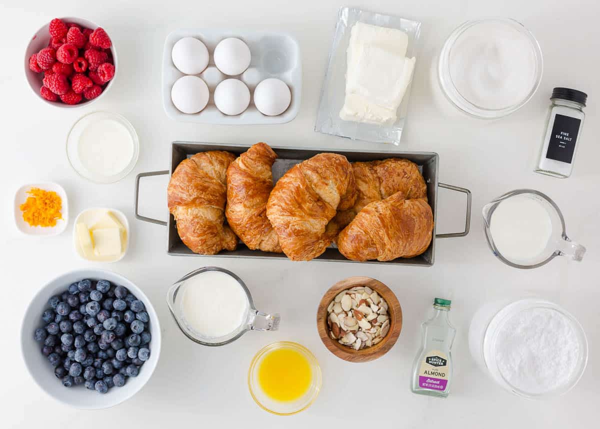 Croissant breakfast casserole ingredients on the counter.