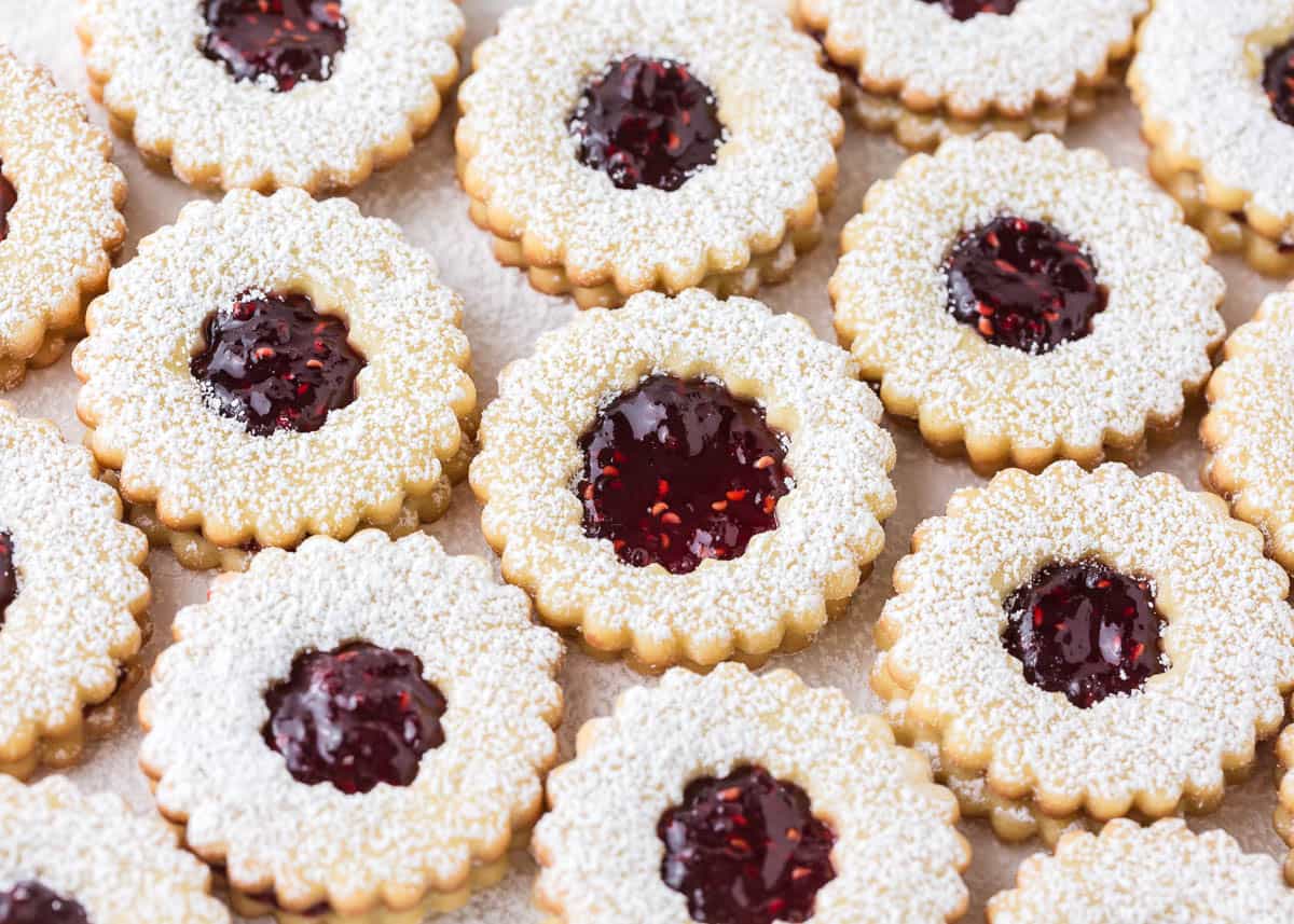 Linzer cookies with raspberry on top.