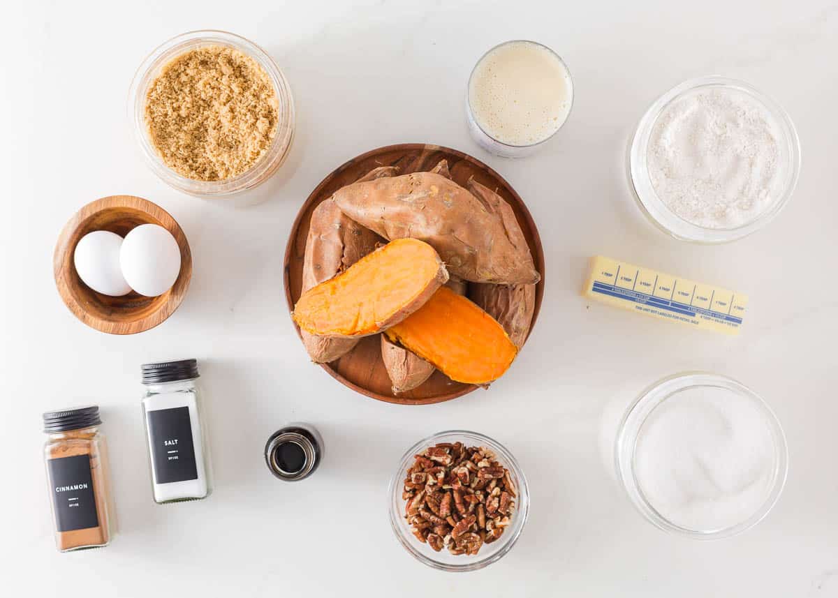 Sweet potato casserole with marshmallows ingredients on counter.