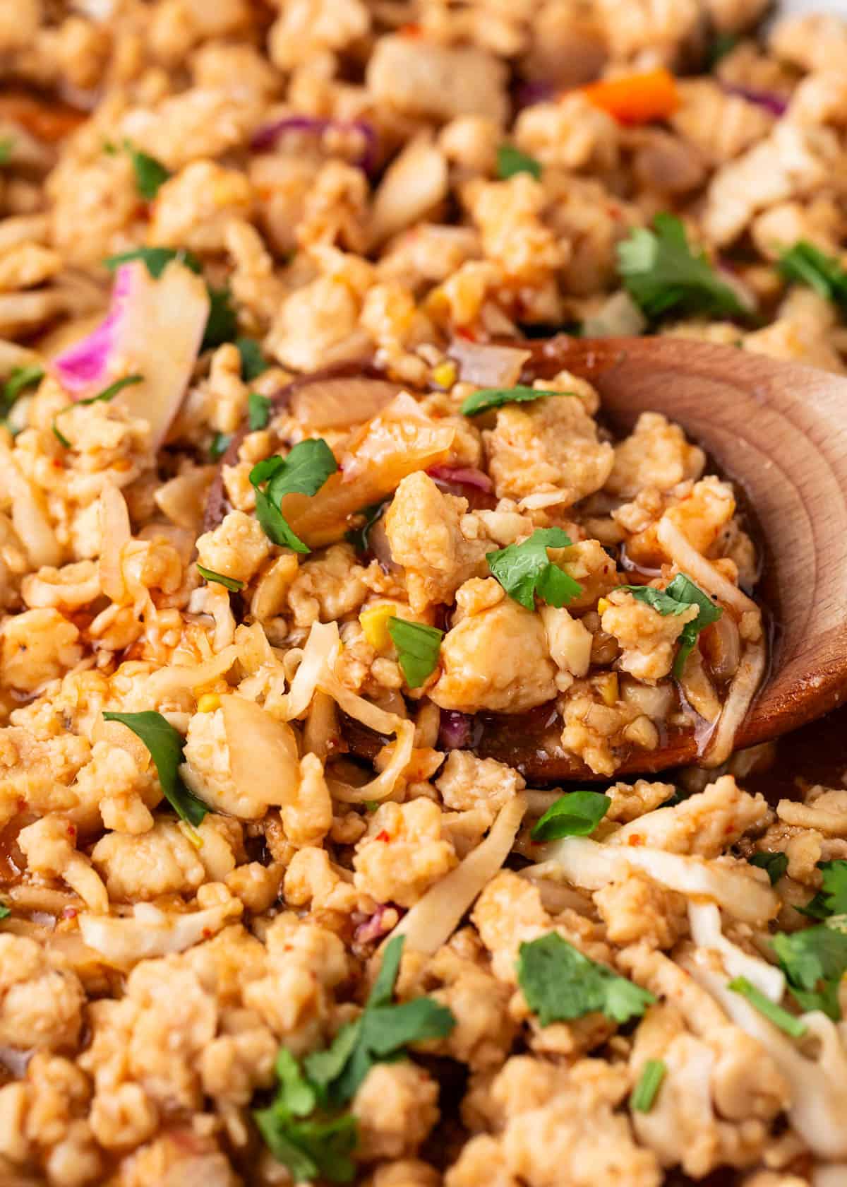 Cooking thai chicken lettuce wraps.