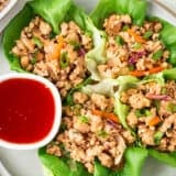 Thai lettuce wraps on a plate.