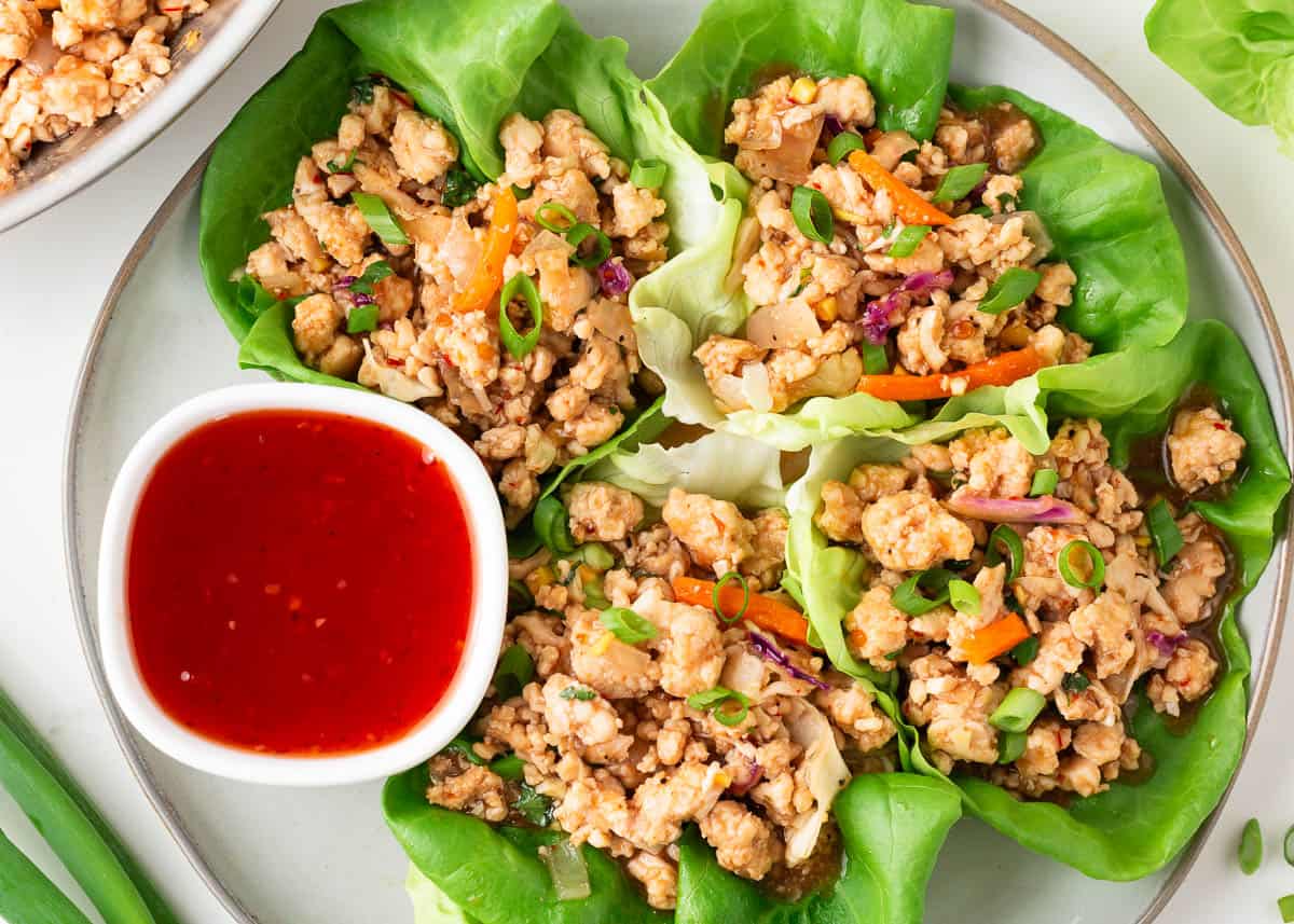 Thai lettuce wraps on a plate.