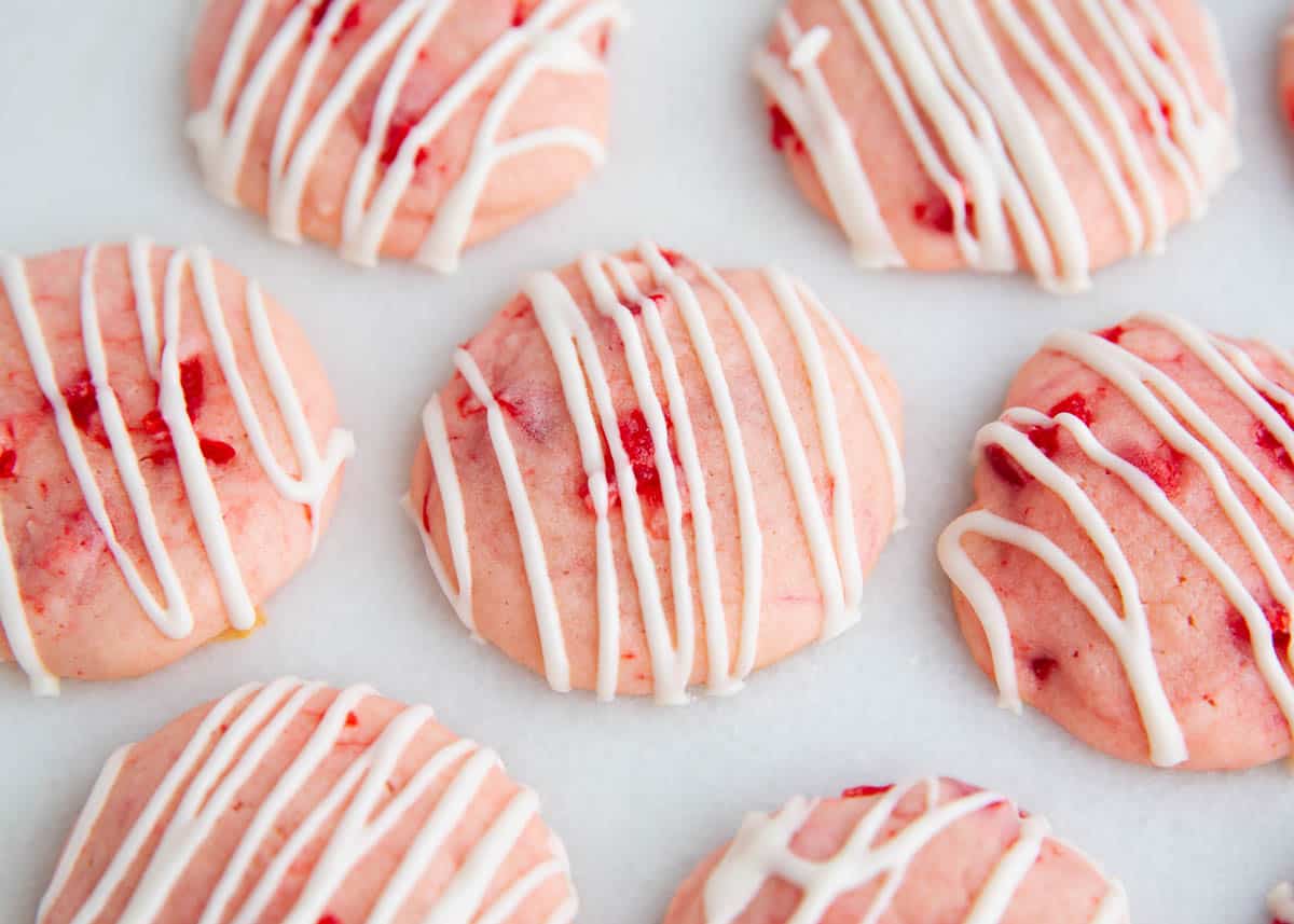 Cherry cookies with chocolate drizzle.