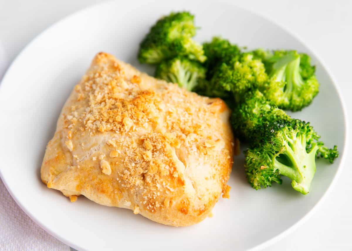 Chicken crescent rolls on a plate.