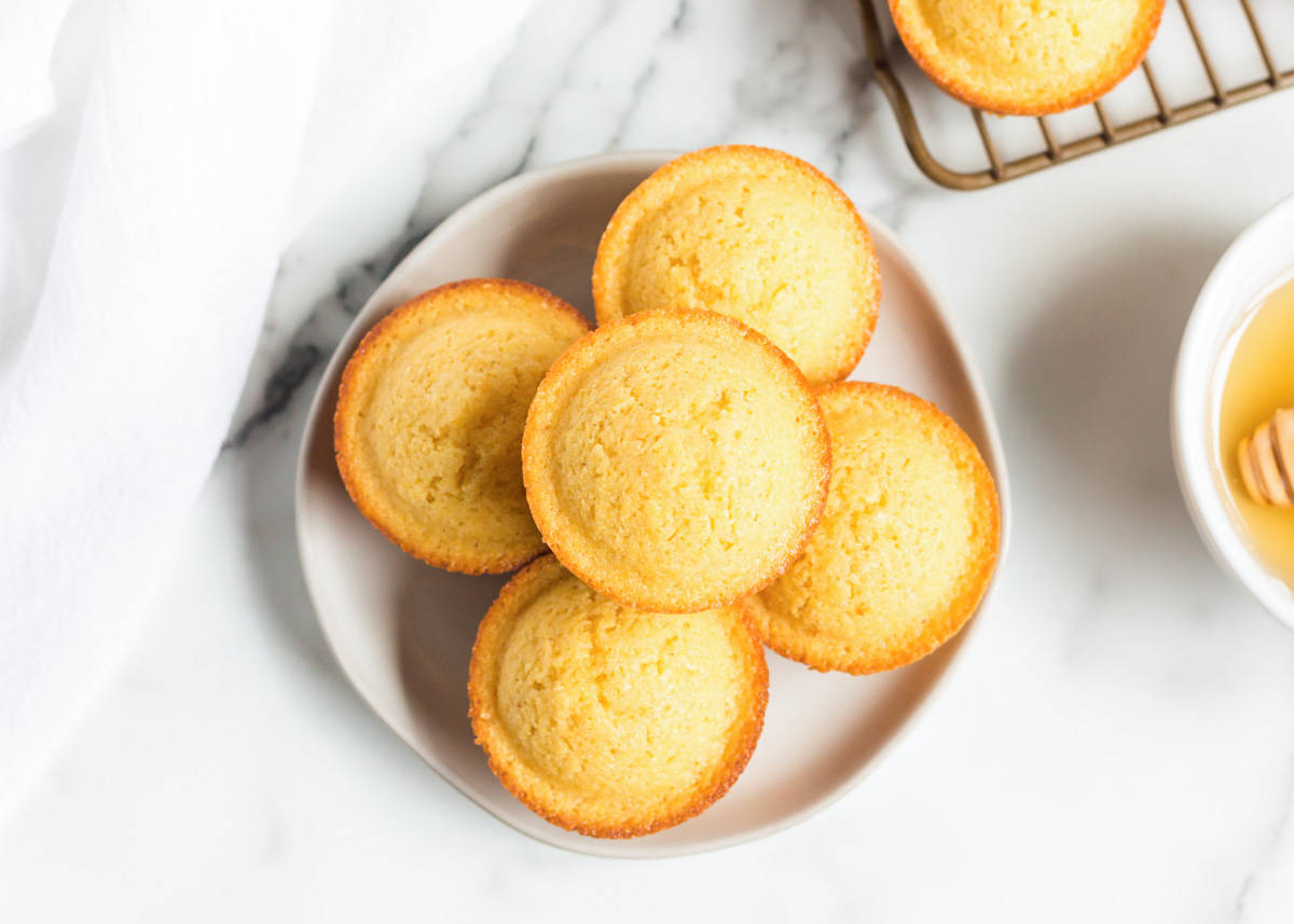 Cornbread muffins on a plate.