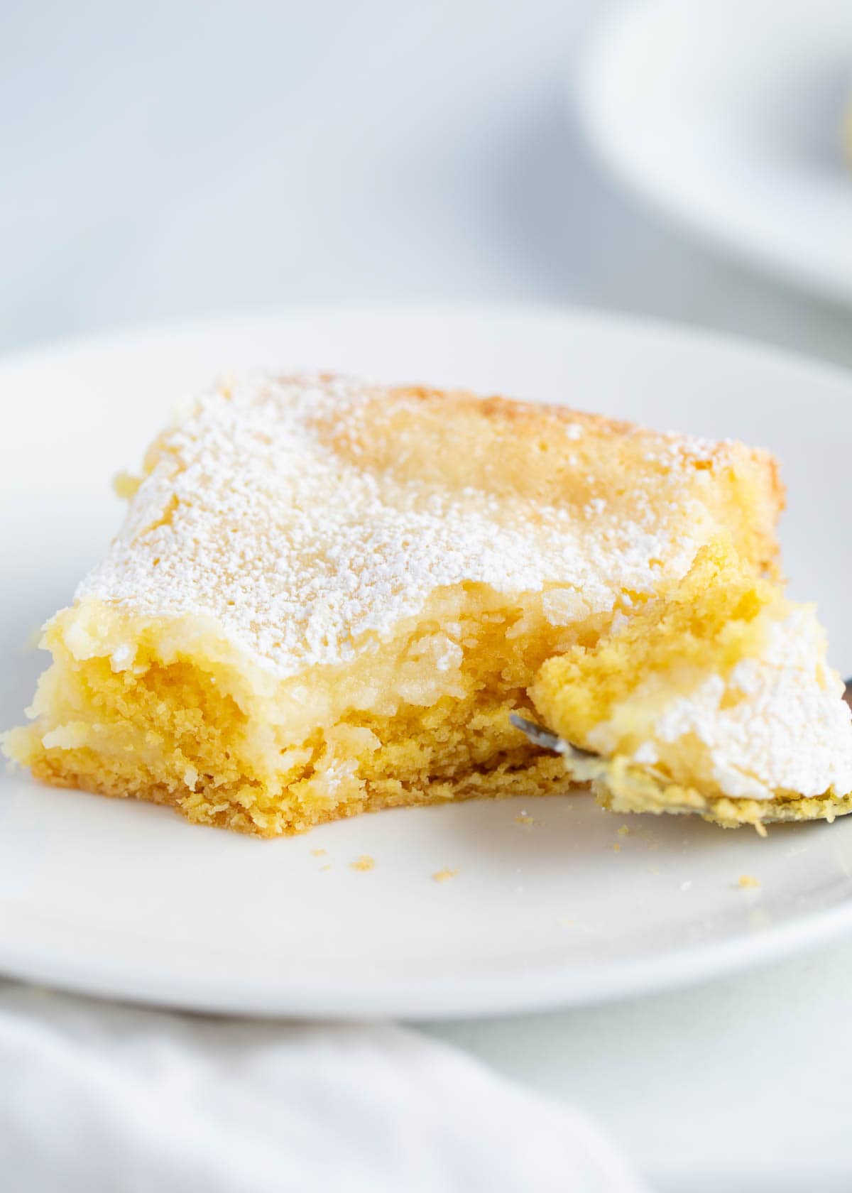 The best gooey butter cake on a plate.