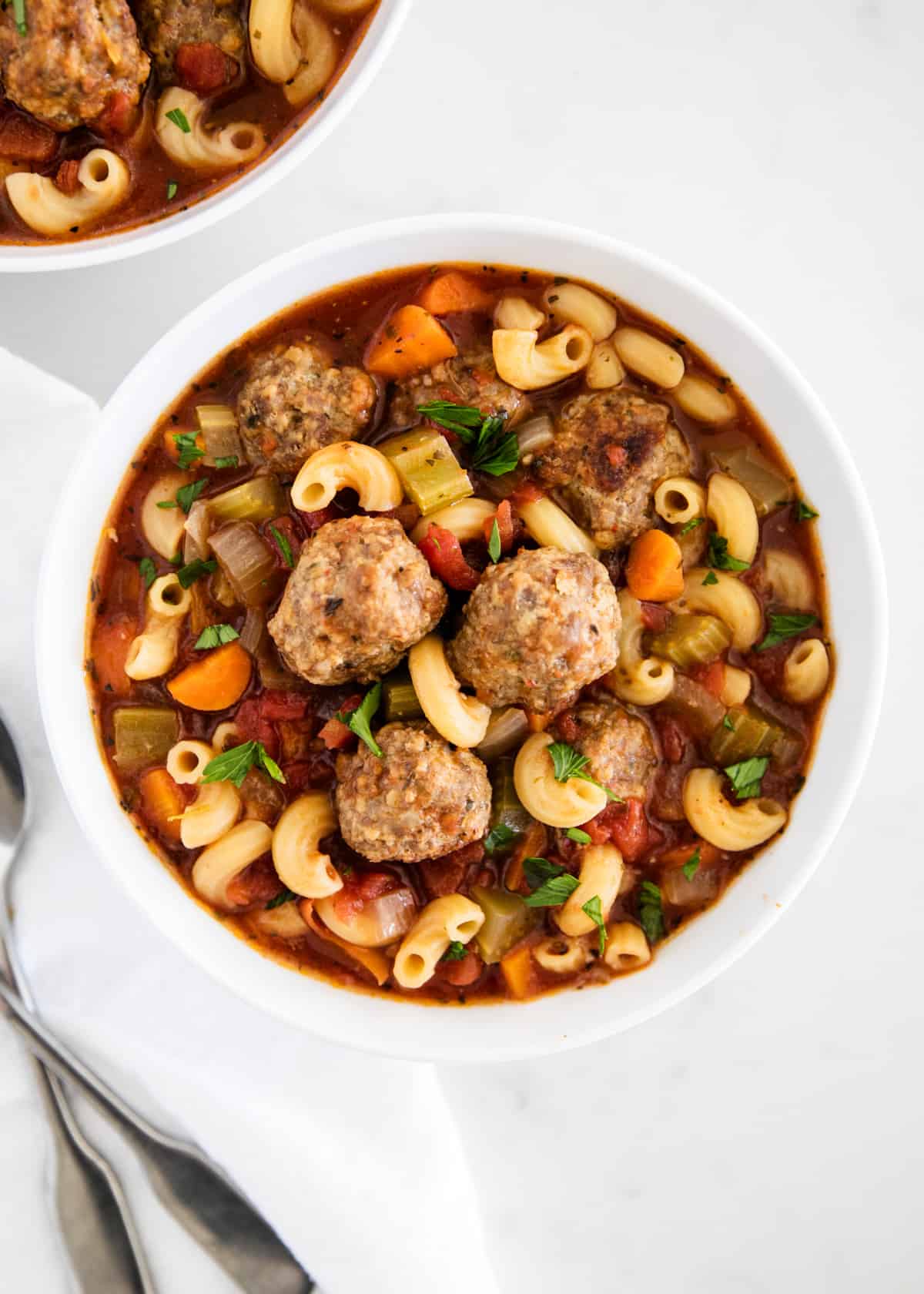Meatball soup in a bowl.