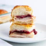 Easy turkey cranberry sliders on a plate.