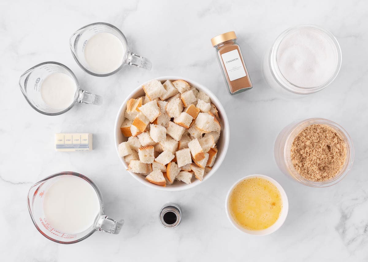 Bread pudding ingredients on counter.