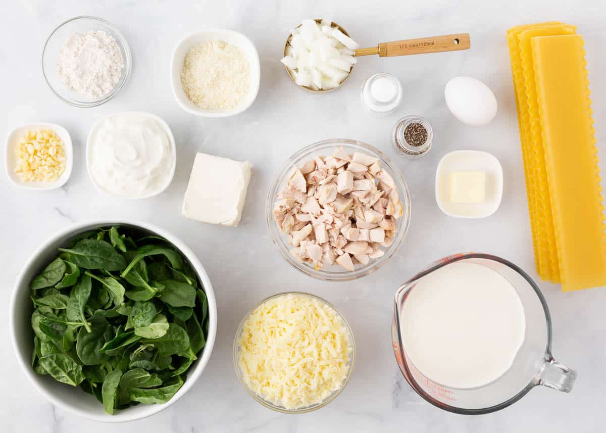 Chicken alfredo ingredients on the counter.