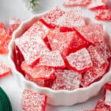 Red hard candy recipe in a Christmas dish.