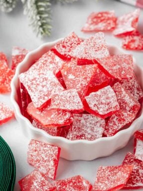 Red hard candy recipe in a Christmas dish.
