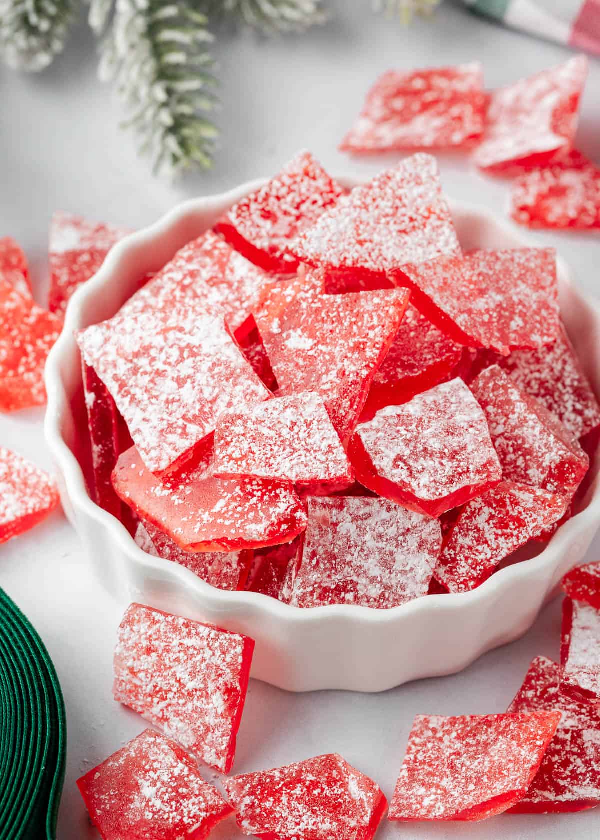 Red hard candy recipe in a Christmas dish. 
