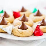 Peanut butter blossoms on a plate.