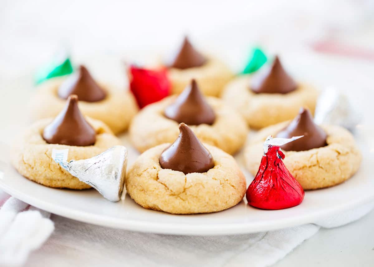 Peanut butter blossoms on a plate.