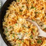 Tuna noodle casserole cooked in a skillet.