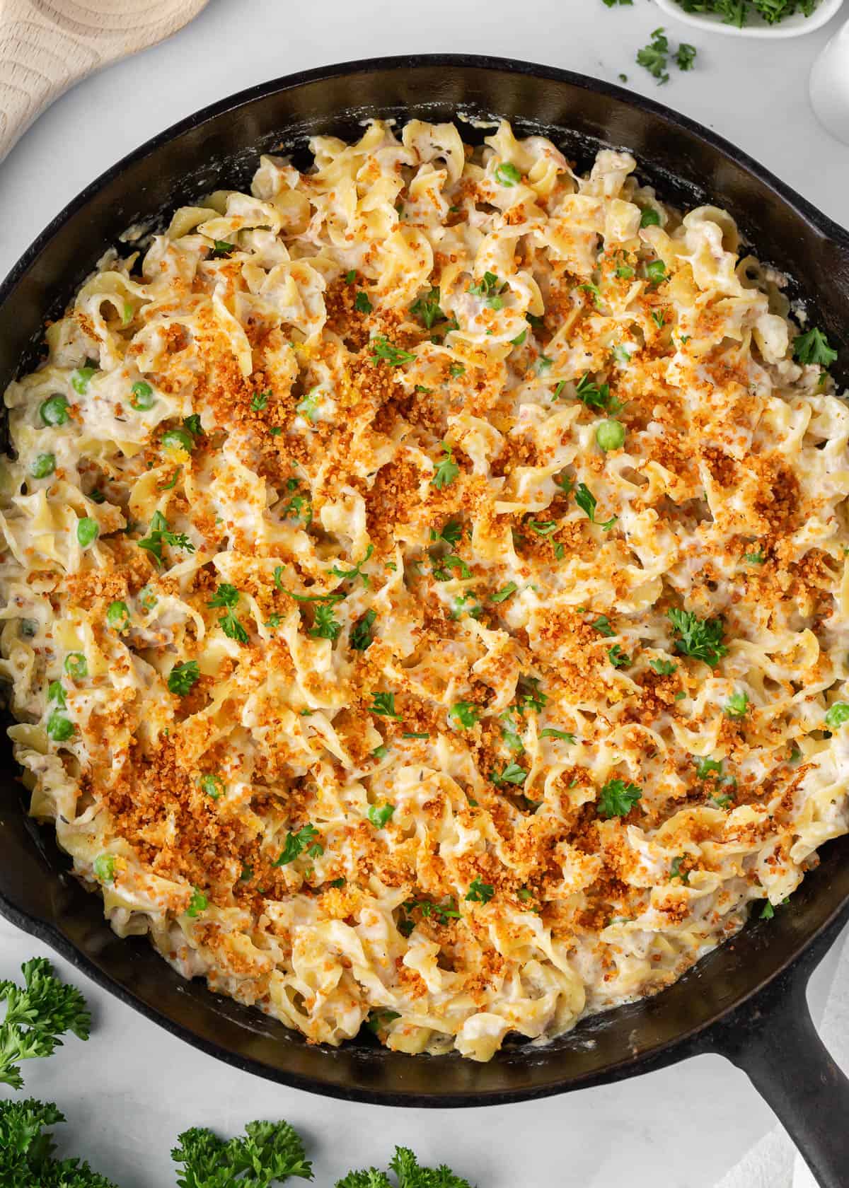 Tuna noodle casserole cooked in a skillet. 