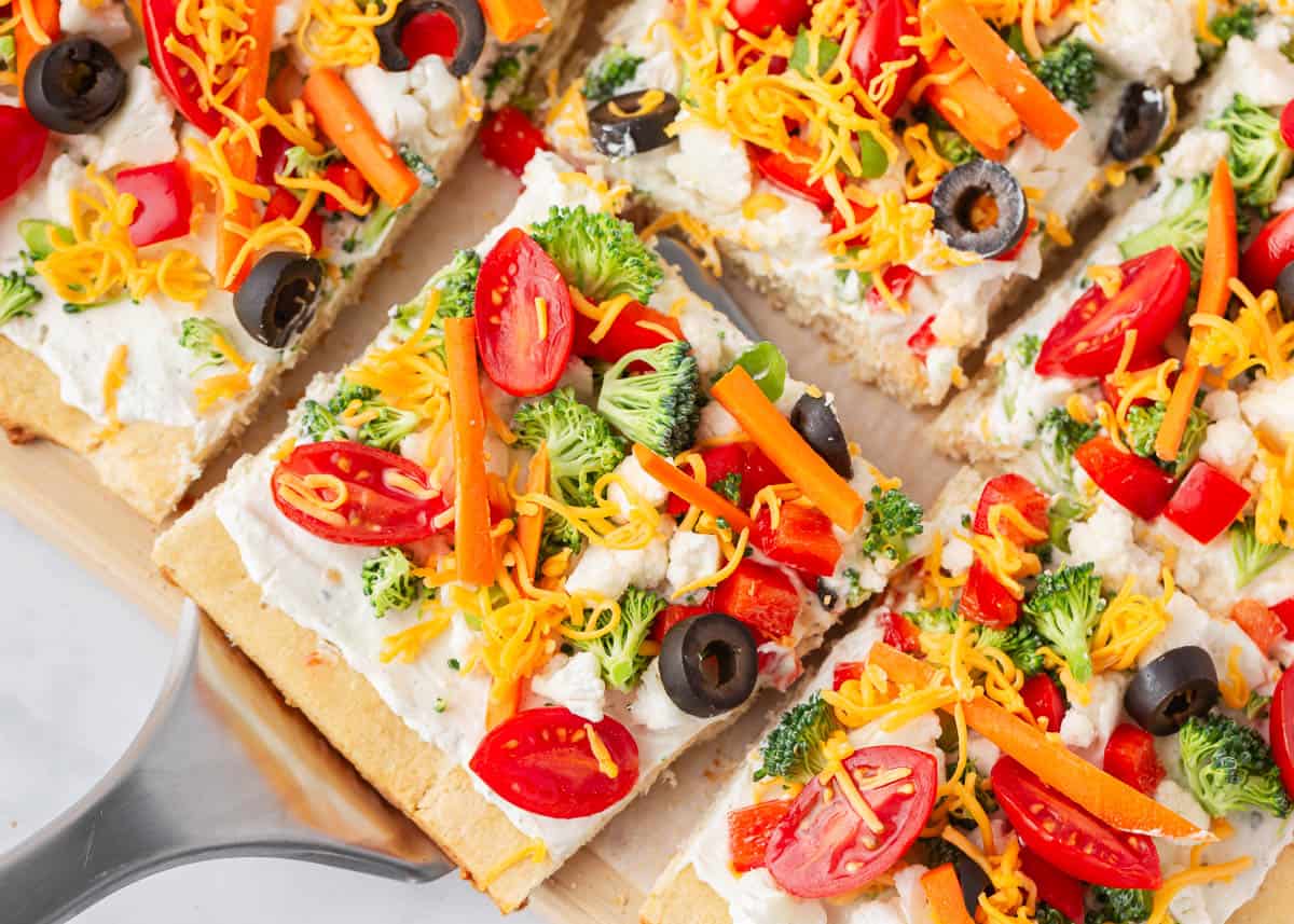 Veggie pizza on a platter.