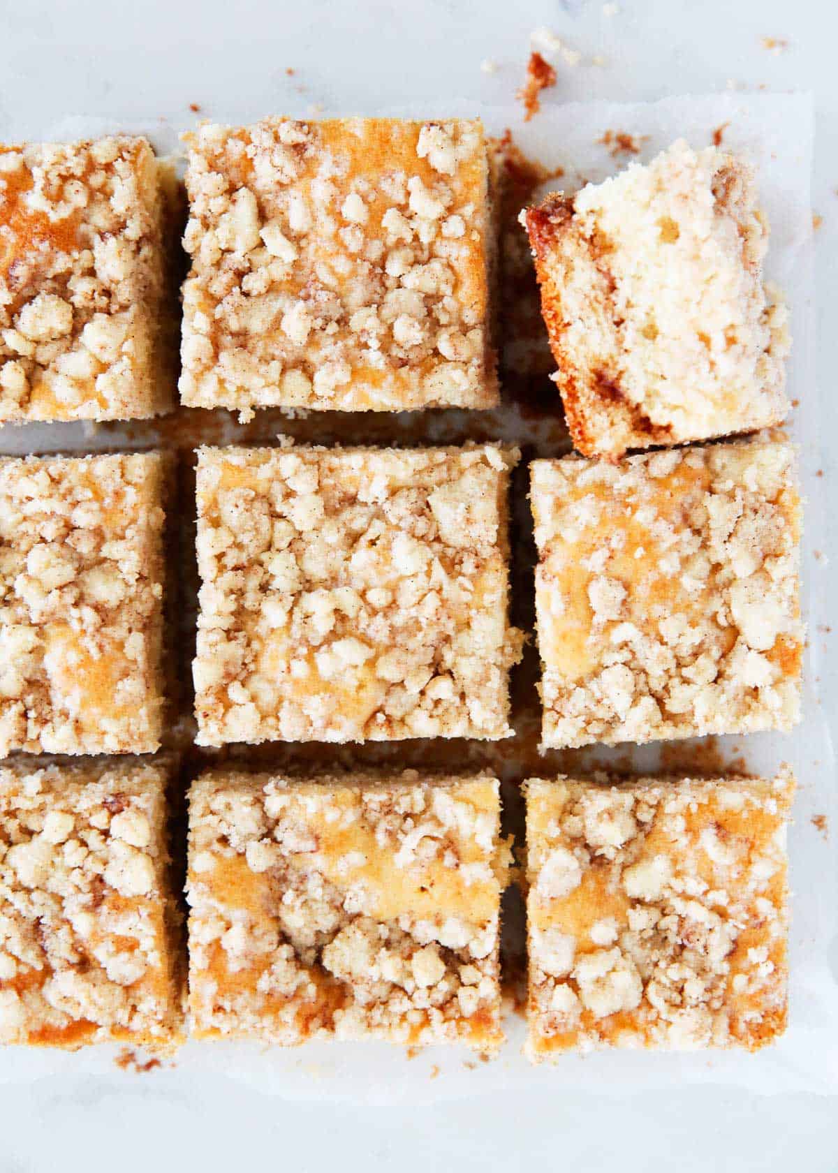 Sliced coffee cake on counter.