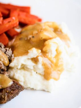 Homemade gravy and mashed potatoes.