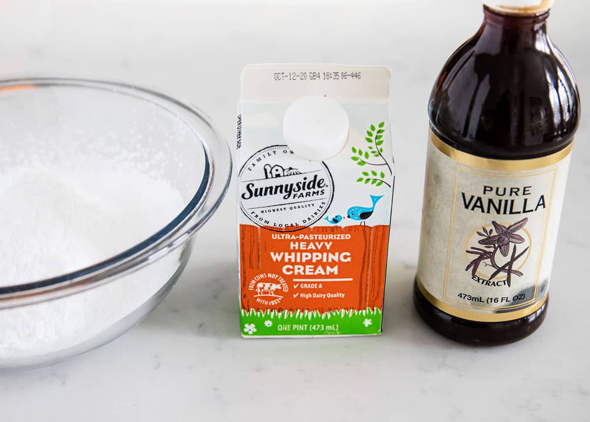 Powdered sugar icing ingredients on counter.