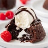 Chocolate lava cake with ice cream and hot fudge on top.