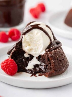 Chocolate lava cake with ice cream and hot fudge on top.