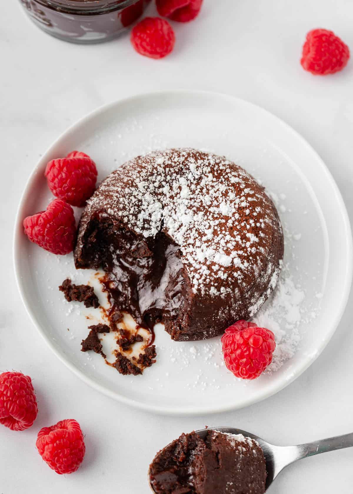 Chocolate lava cake with raspberries.