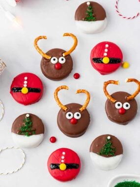 Christmas Oreos covered in chocolate and decorated.