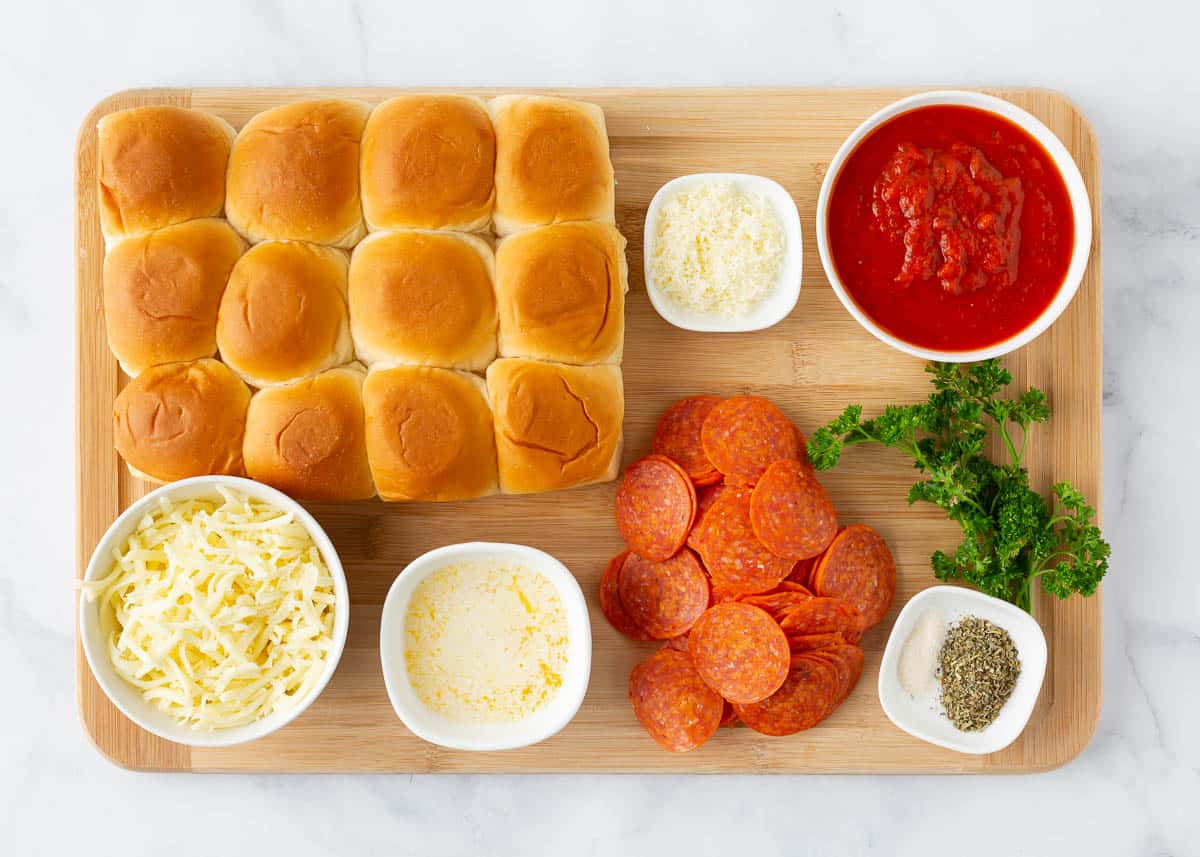 Pizza slider ingredients on the counter.