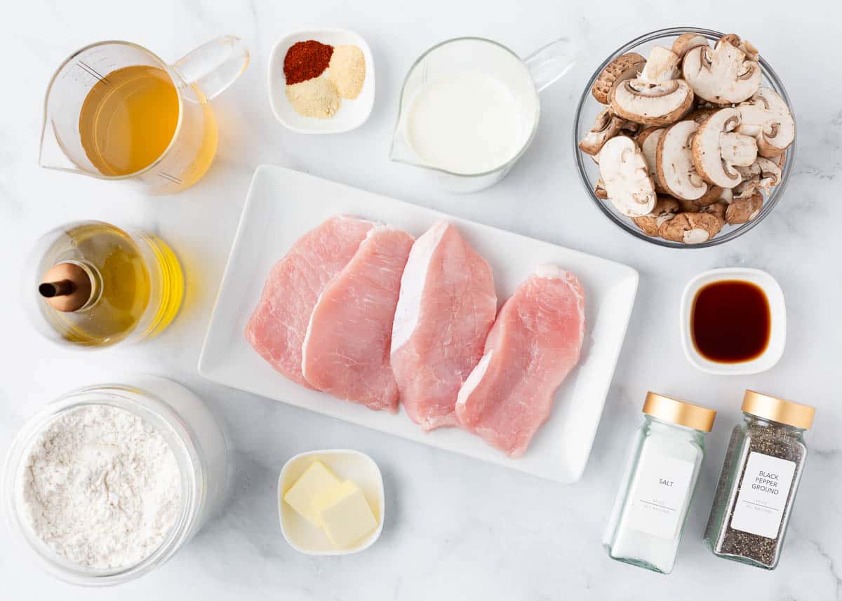 Smothered pork chops ingredients on the counter.