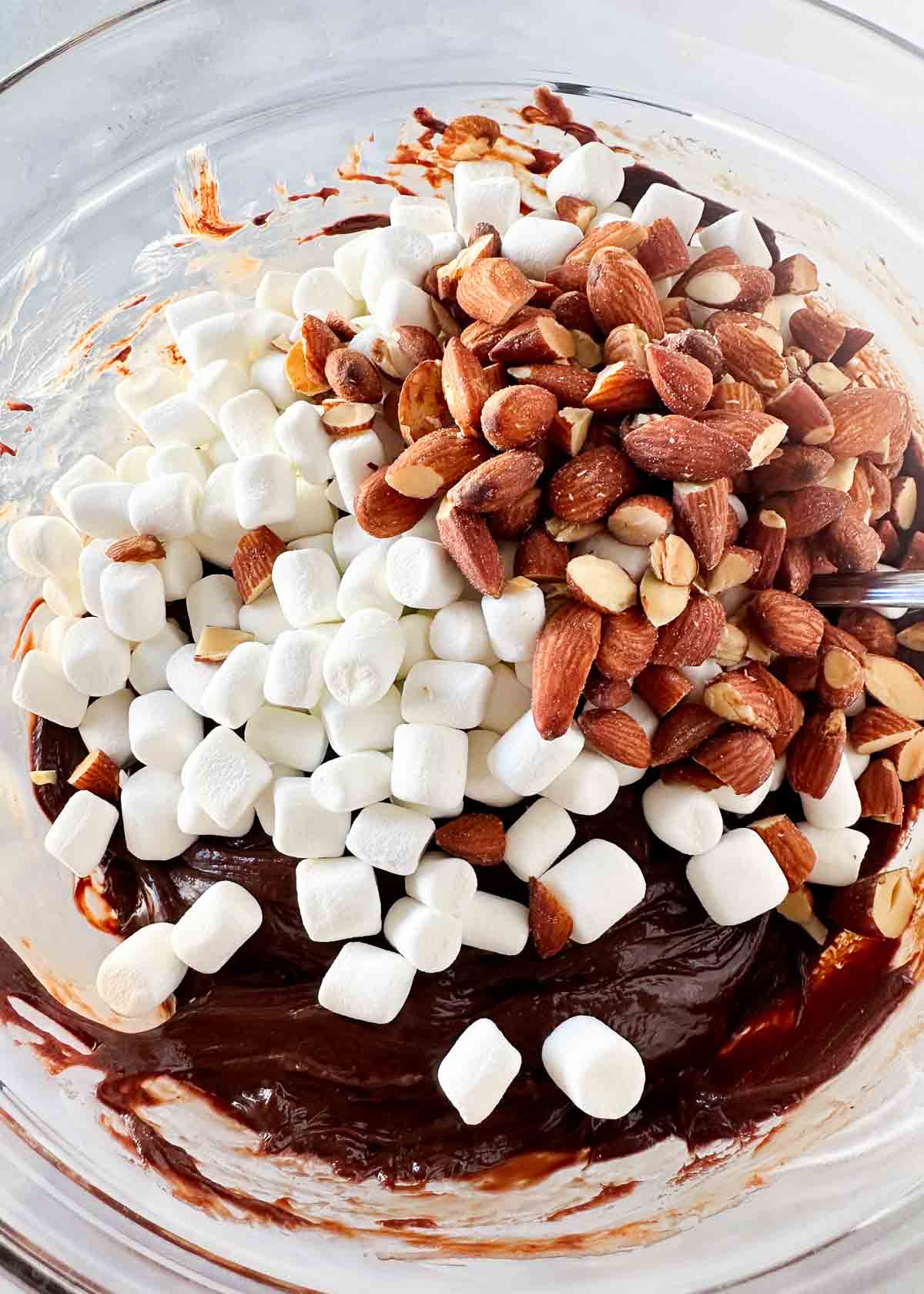 Showing how to make rocky road fudge in a bowl.