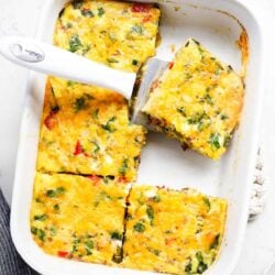 Sliced overnight breakfast casserole.