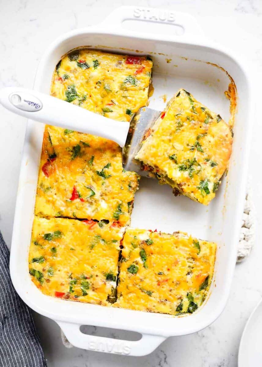 Sliced overnight breakfast casserole.