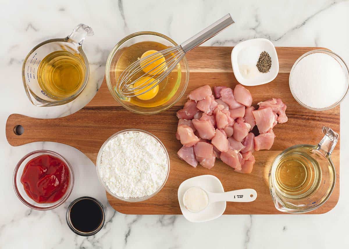 Sweet and sour chicken ingredients on a board. 