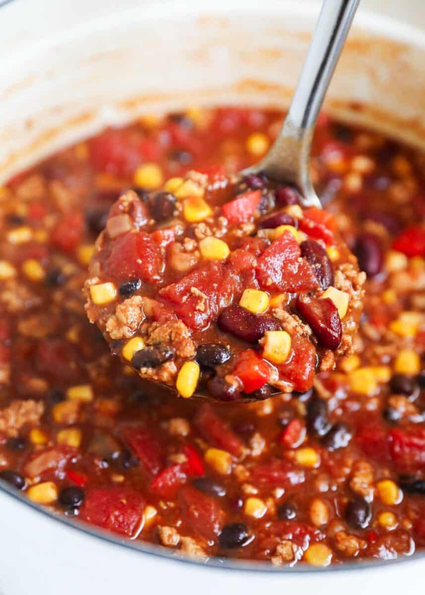 Ladle full of turkey chili.