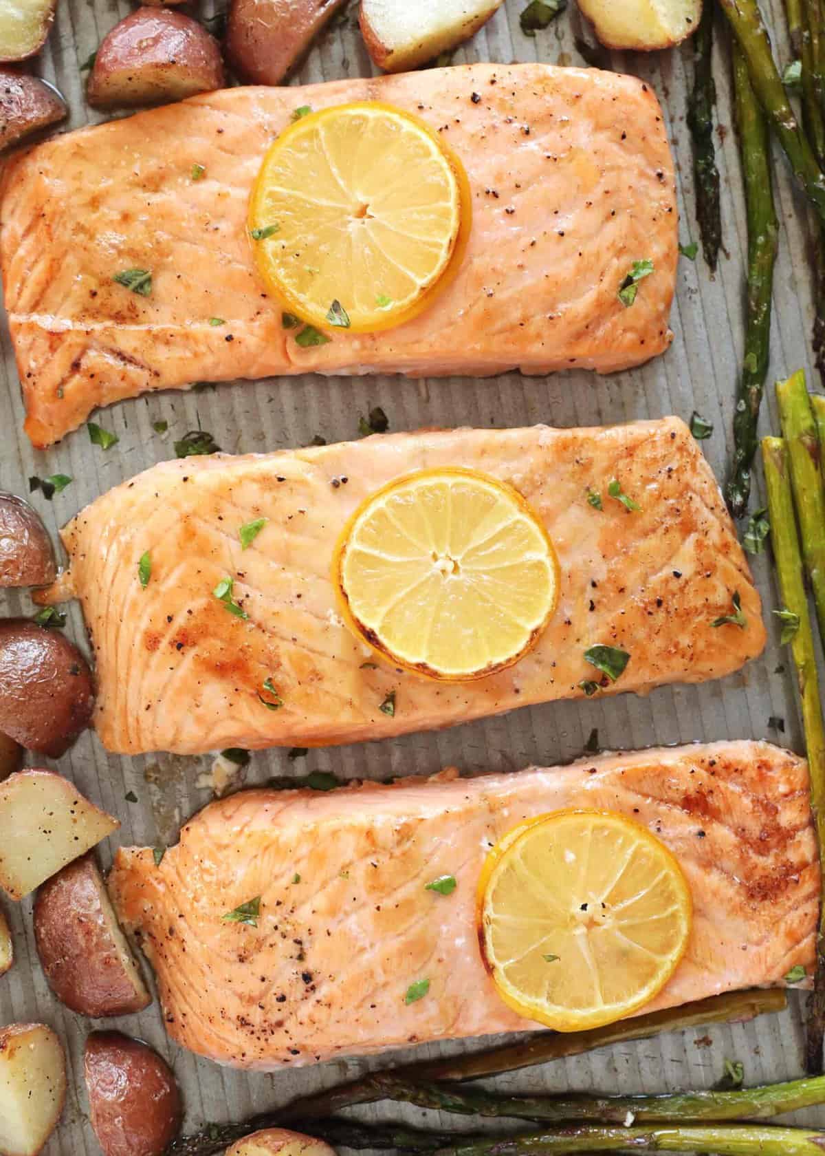 Baked salmon on a baking sheet. 