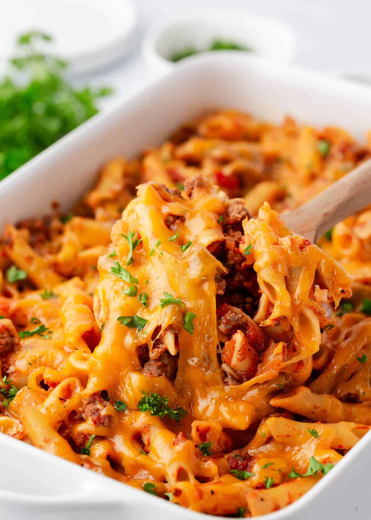 Spoonful of ground beef casserole.