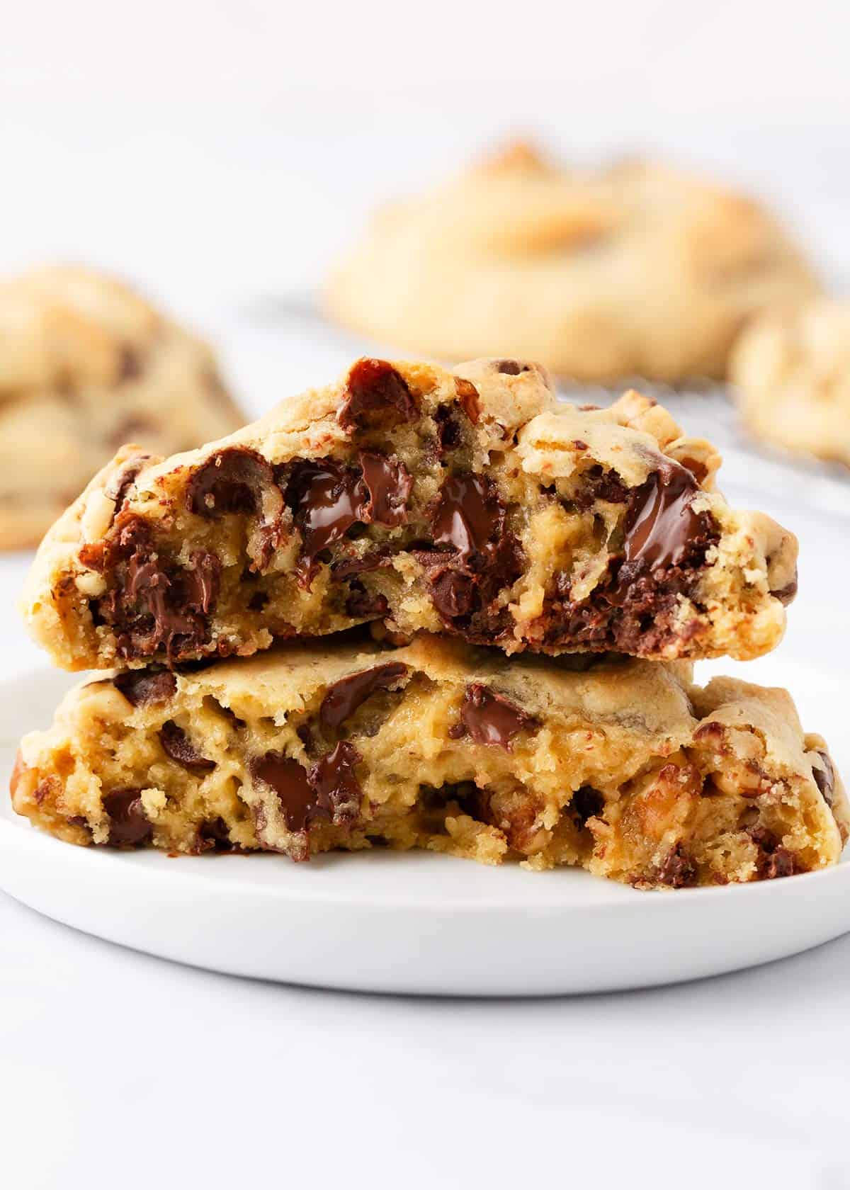 Levain chocolate chip cookies on a plate.