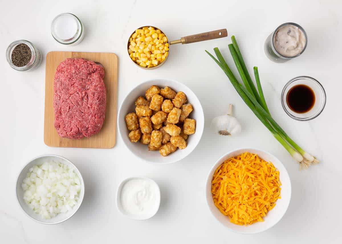 Tater tot casserole ingredients on the counter.