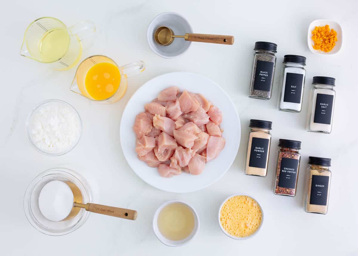 Orange chicken ingredients on counter.