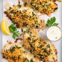 Baked fish on a sheet pan.