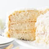 Getting a slice of coconut cake.