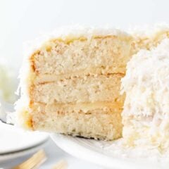 Getting a slice of coconut cake.