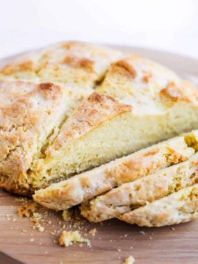 Sliced Irish Soda Bread recipe on a board.